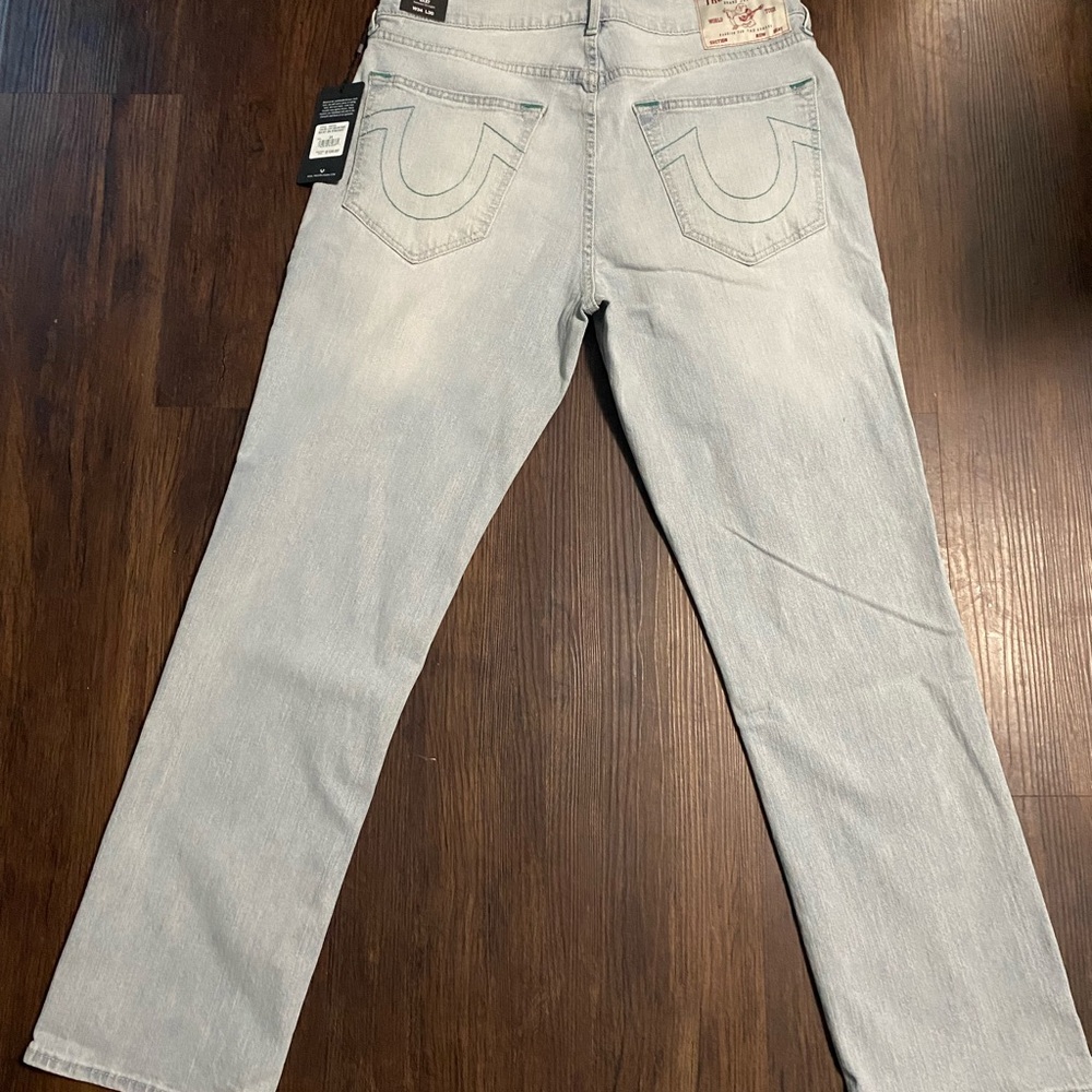 True Religion Ricky Relaxed Straight Jeans in Classic Blue with green stitching